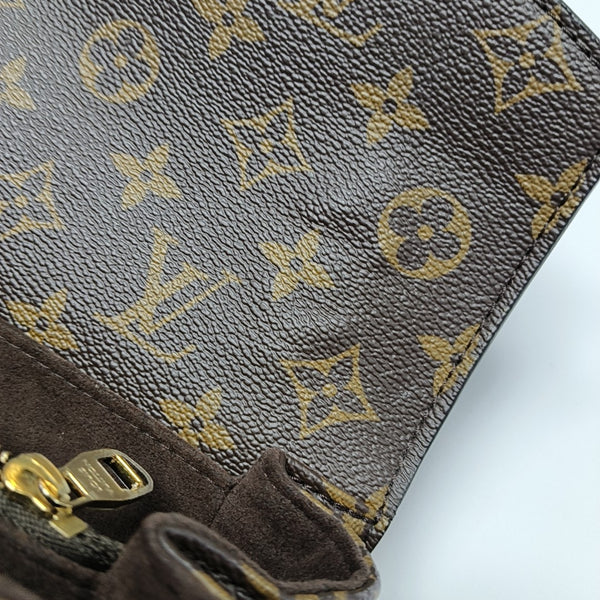MÉTIS EAST WEST Monogram Coated Canvas Brown