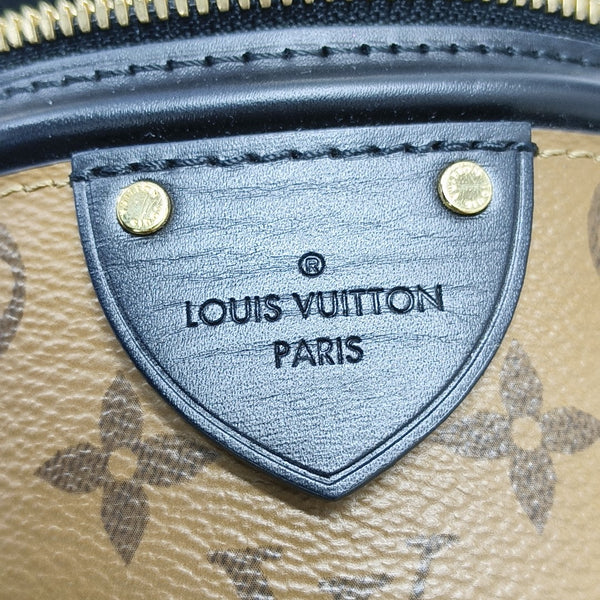 CANNES PM Monogram Coated Canvas Brown