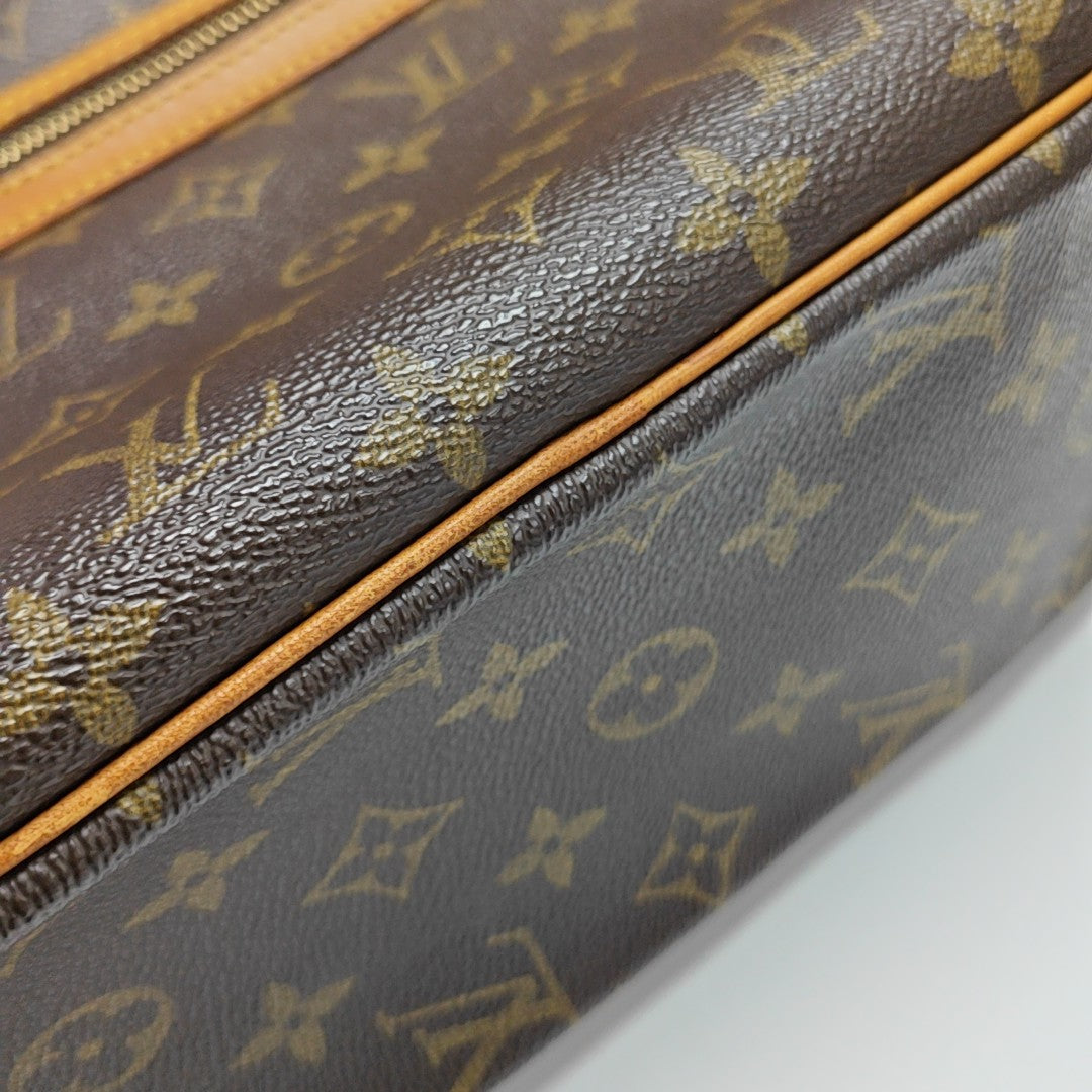CITE GM Monogram Coated Canvas Brown