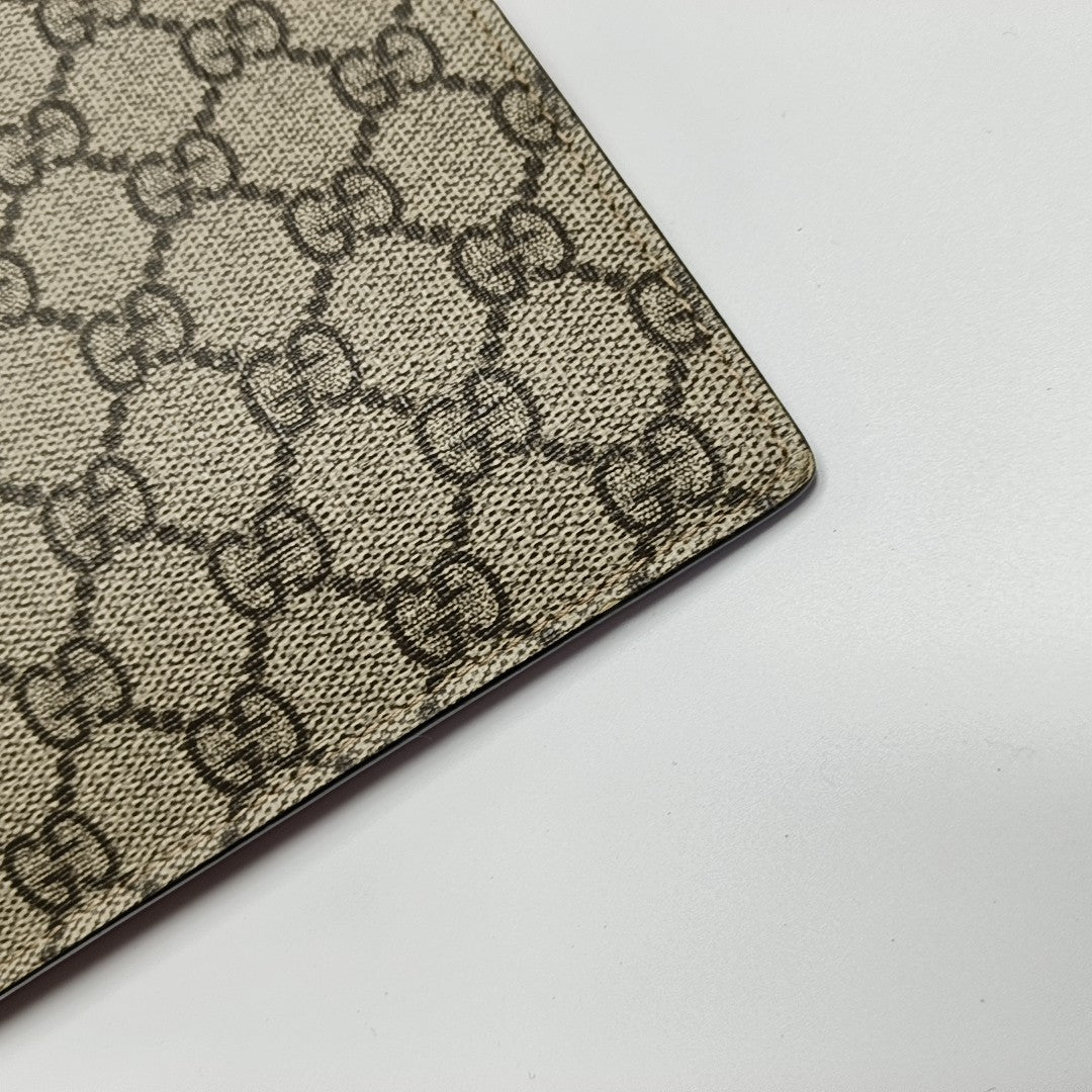Monogram Coated Canvas Clutch Beige
