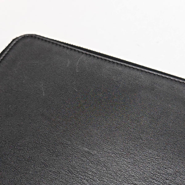 Authenticated pre-owned  Monster Leather Black - Clutch at Looply
