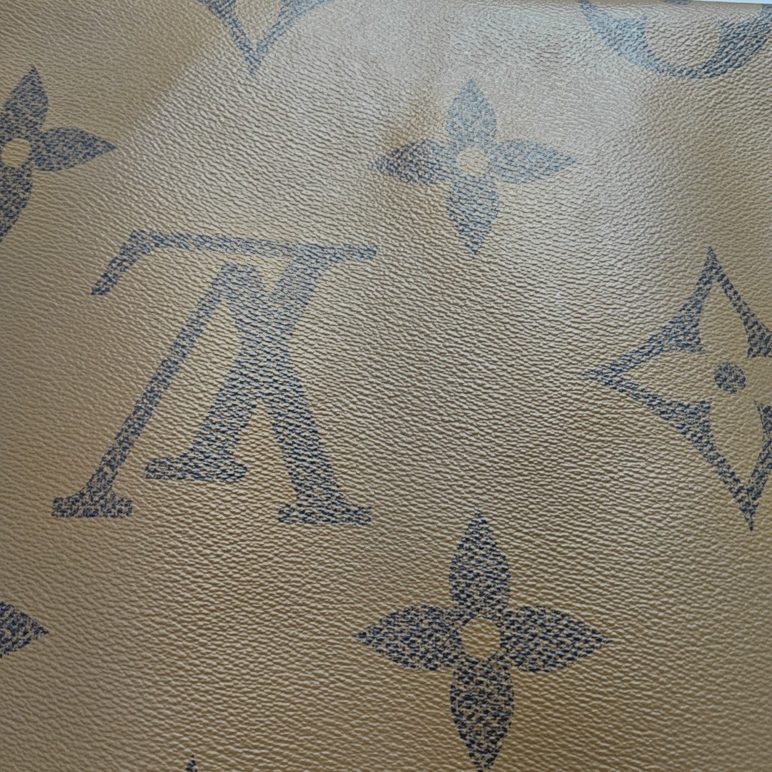 ONTHEGO GM Monogram Coated Canvas Brown