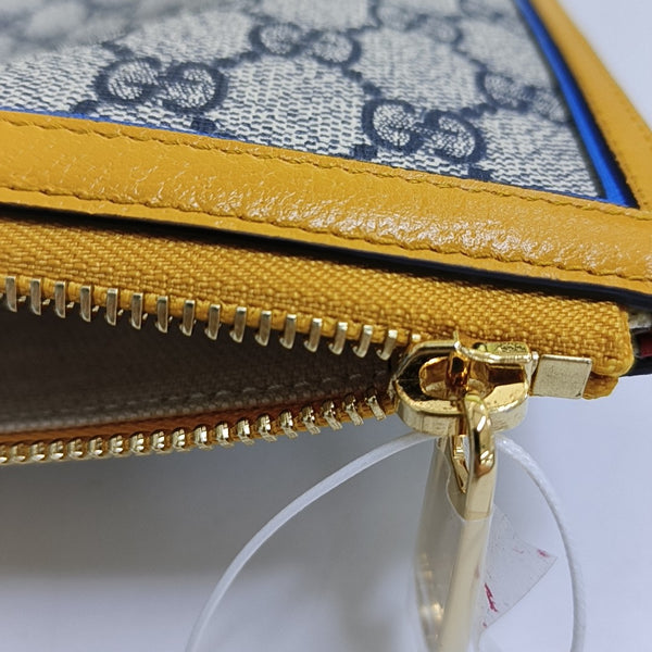 Monogram Coated Canvas Clutch Beige