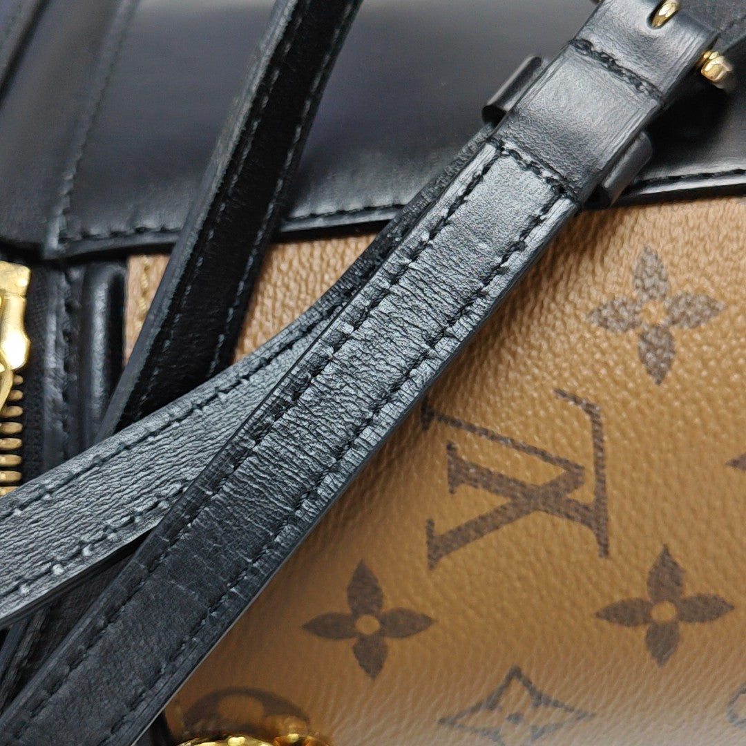 CANNES PM Monogram Coated Canvas Brown