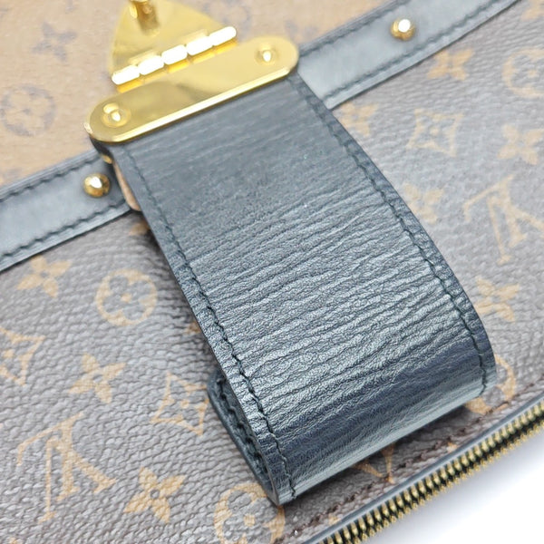 TRUNK Monogram Coated Canvas Brown