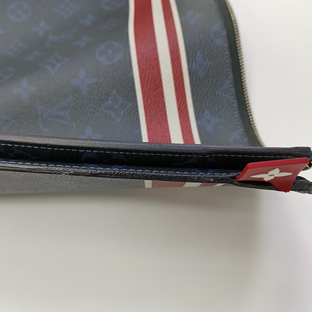 Monogram Coated Canvas Clutch Blue