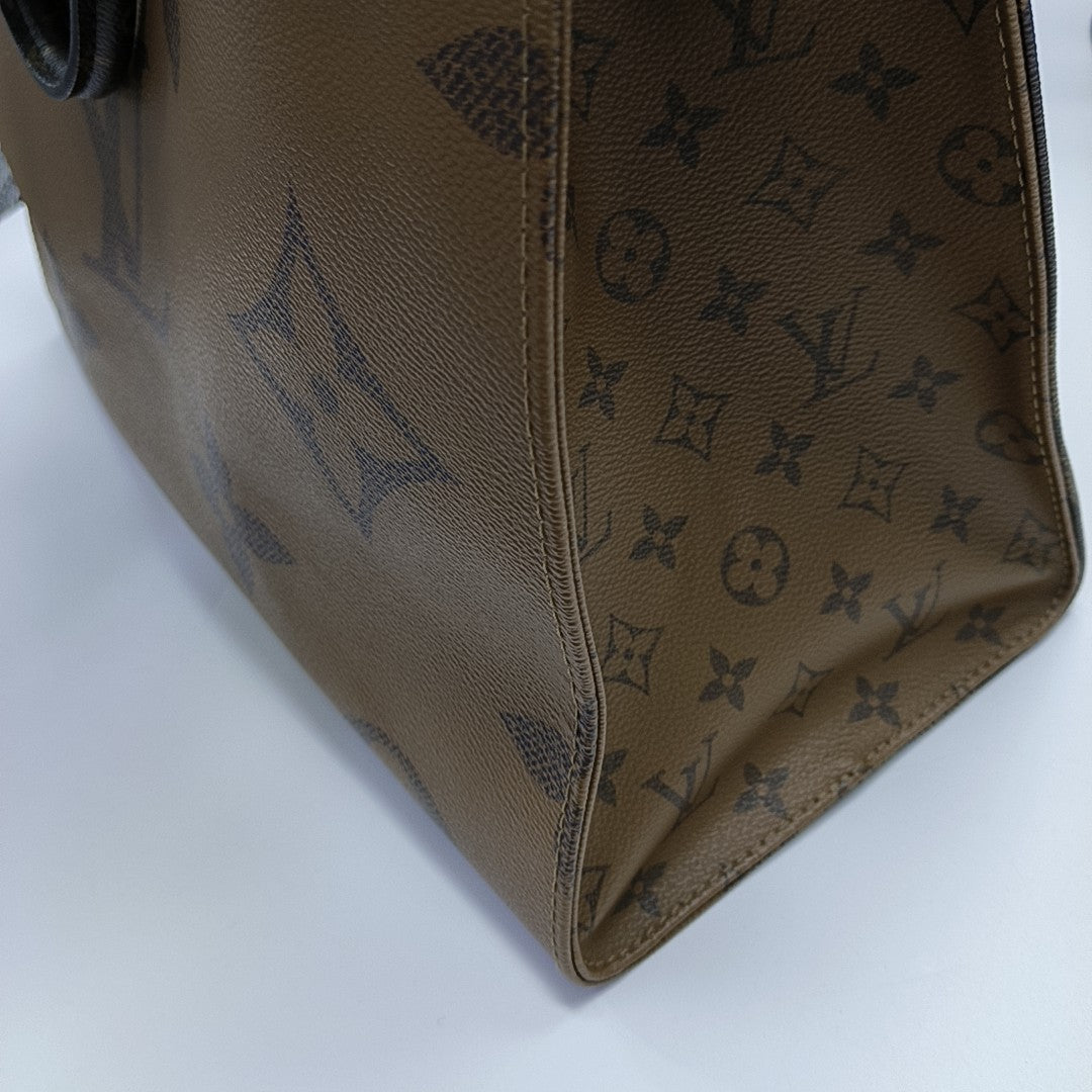 ONTHEGO GM Monogram Coated Canvas Brown