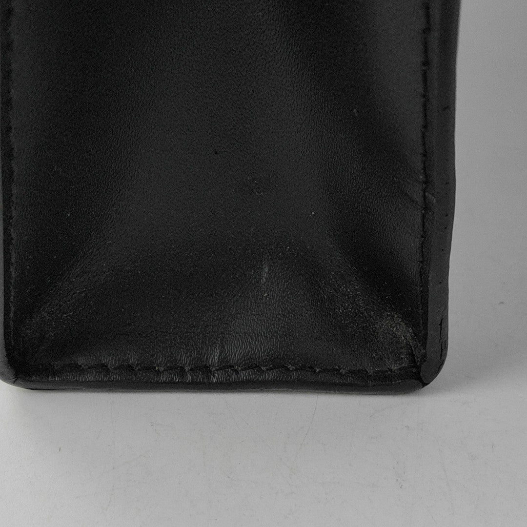 Pochette Voyag MM Monogram Coated Canvas Black