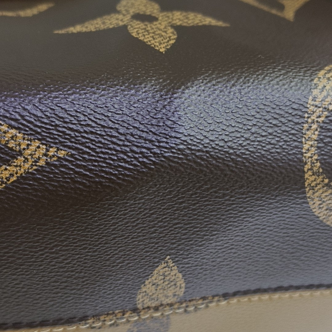 ONTHEGO MM Monogram Coated Canvas Brown