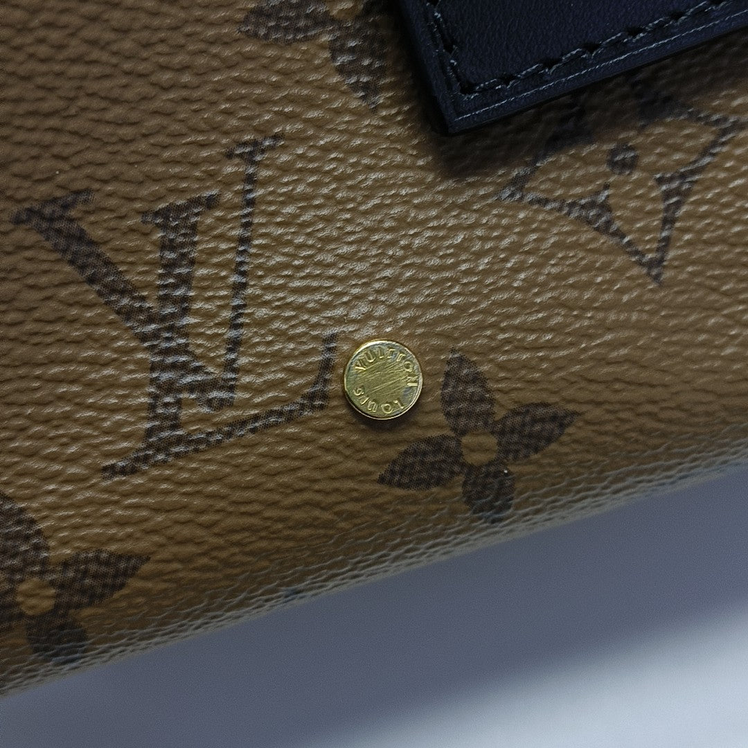 ATLANTIS PM Monogram Coated Canvas Brown