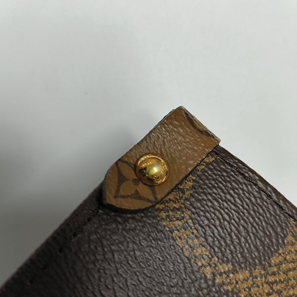 ONTHEGO MM Monogram Coated Canvas Brown