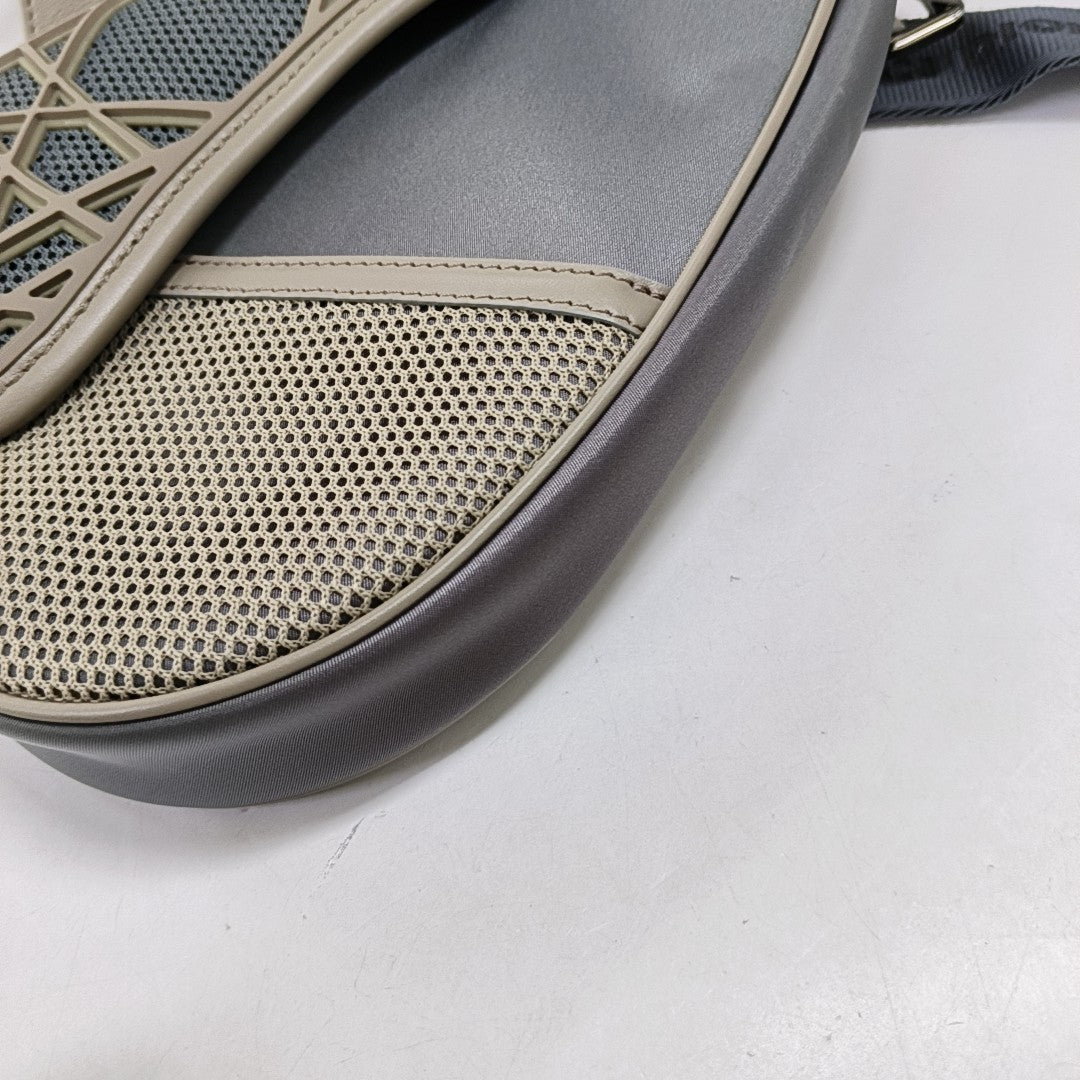 Authenticated pre-owned  Saddle Calfskin Gray - Crossbody Bag at Looply