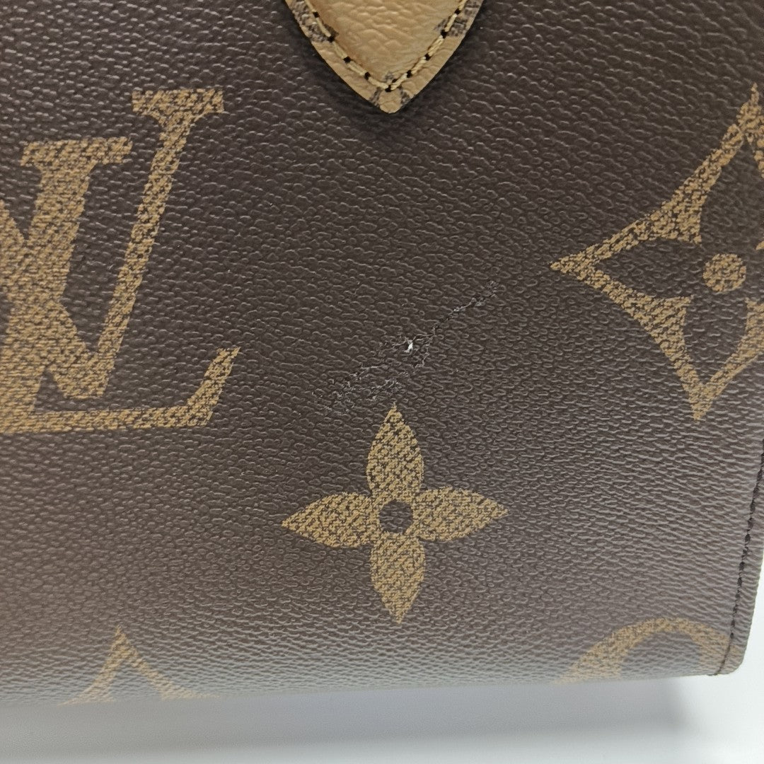 ONTHEGO PM Monogram Coated Canvas Brown