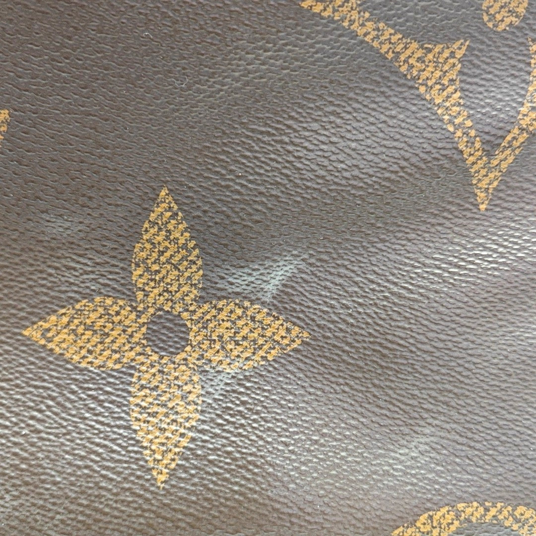 ONTHEGO MM Monogram Coated Canvas Brown