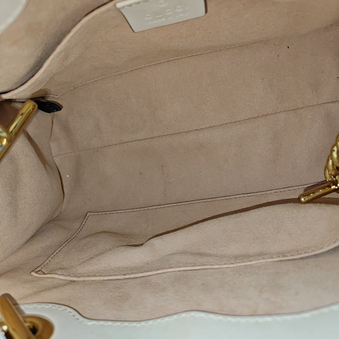 Padlock Small Monogram Coated Canvas Beige