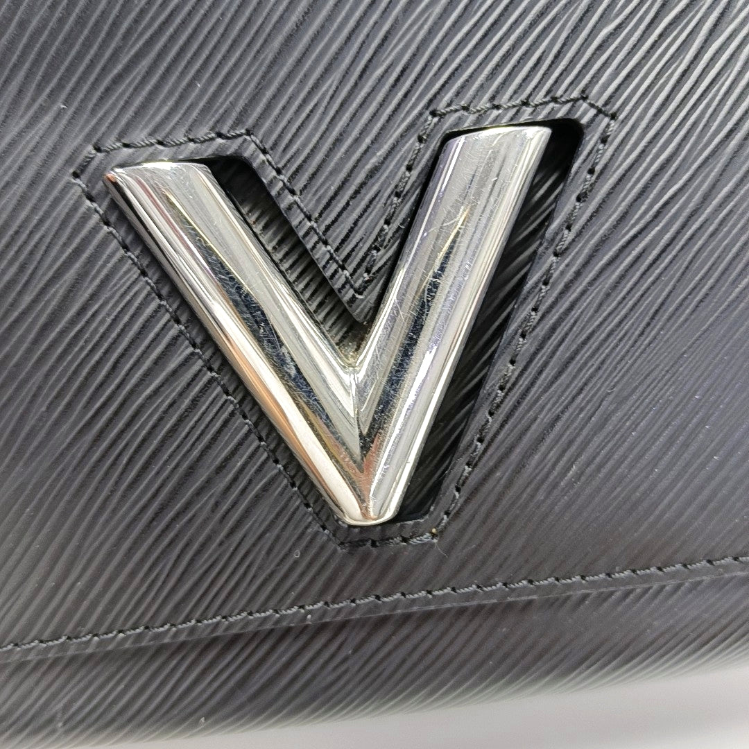 Authenticated pre-owned  TWIST - Crossbody Bag at Looply