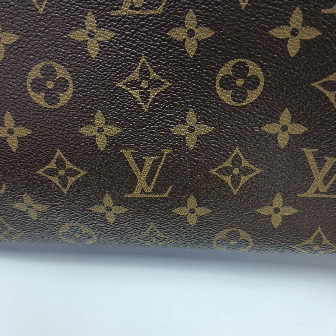 MONTAIGNE GM Monogram Coated Canvas Brown