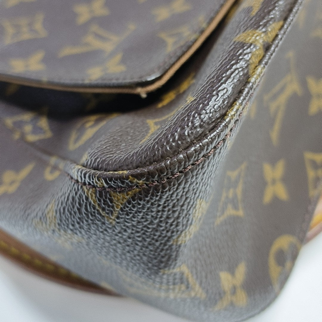 LOOPING PM Monogram Coated Canvas Brown