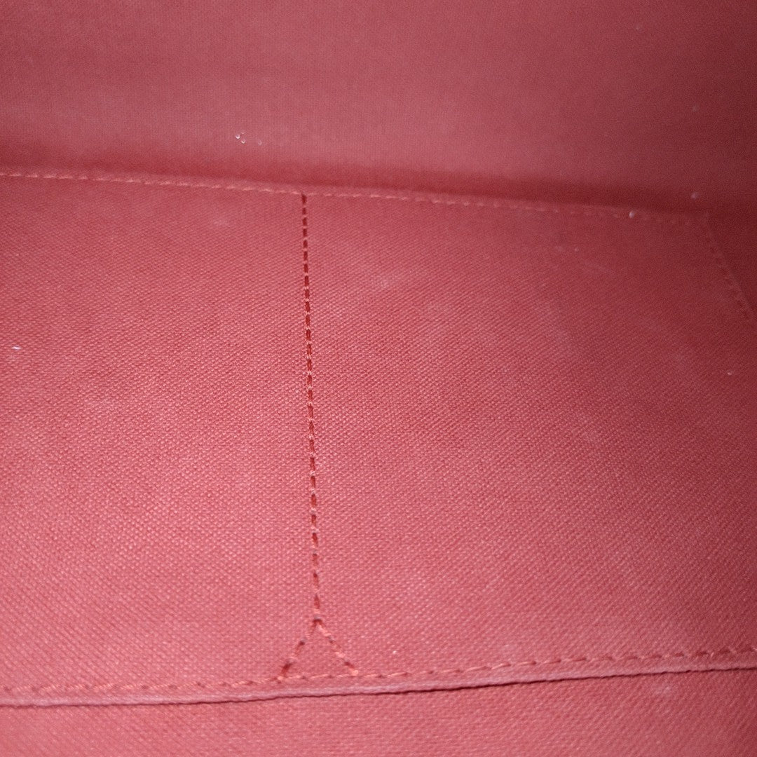 ONTHEGO MM Monogram Coated Canvas Brown