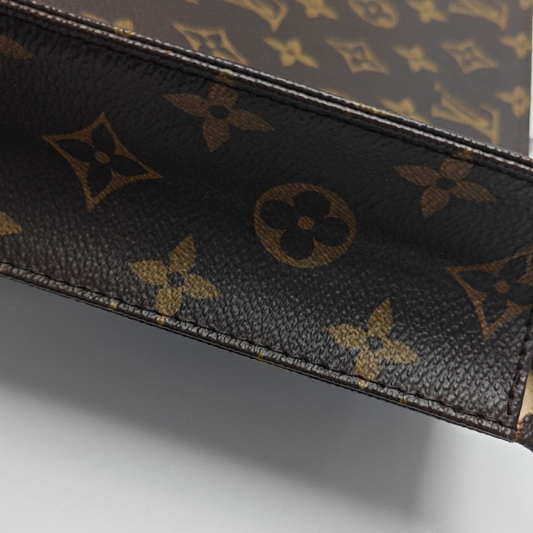 TOILET POCKET 26 Monogram Coated Canvas Brown