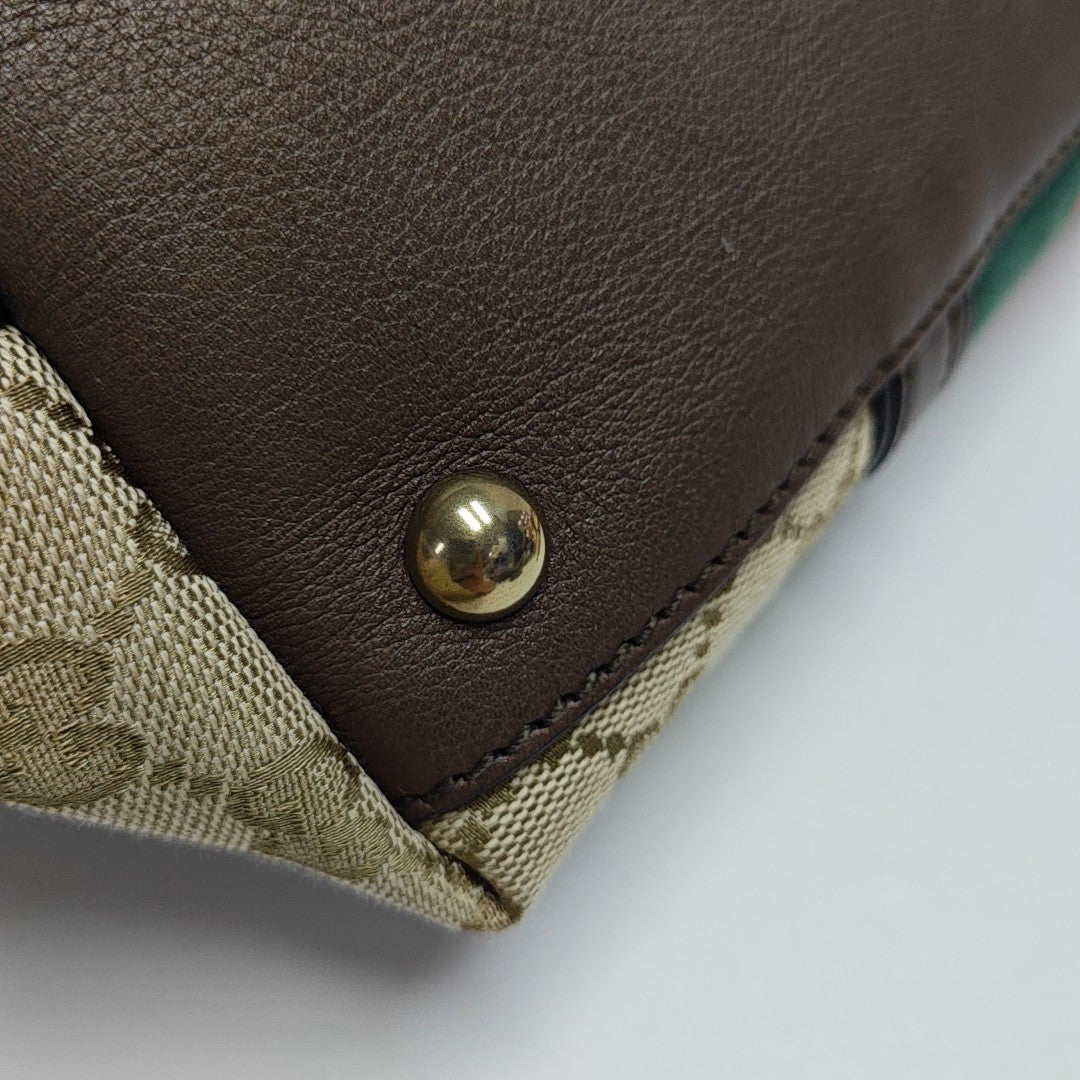 Rania Monogram Canvas Brown