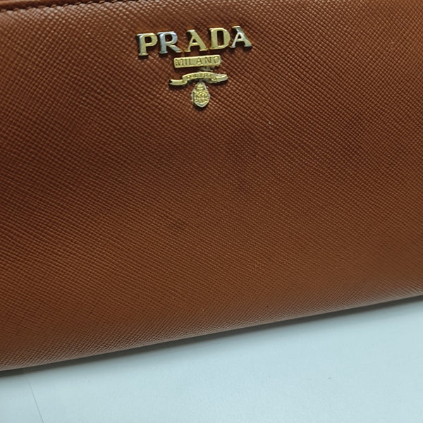 Zippy Wallet Saffiano Calfskin Orange Wallet