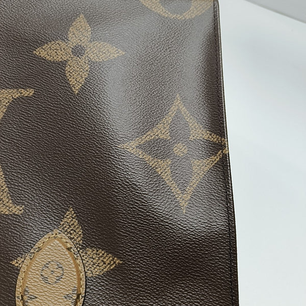 ONTHEGO MM Monogram Coated Canvas Brown