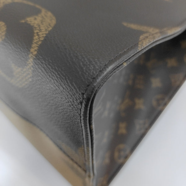 ONTHEGO GM Monogram Coated Canvas Brown