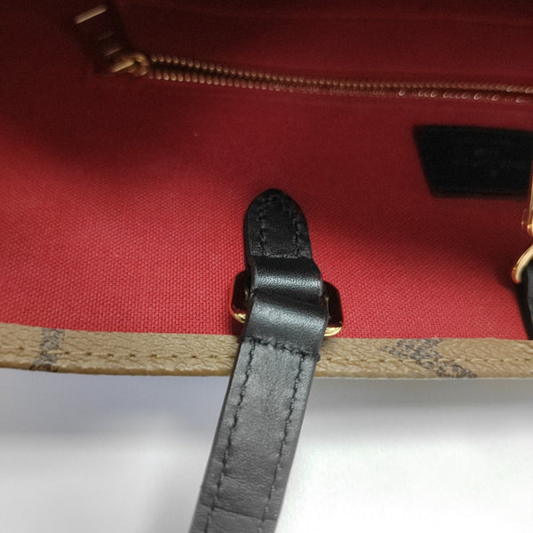 ONTHEGO MM Monogram Coated Canvas Brown