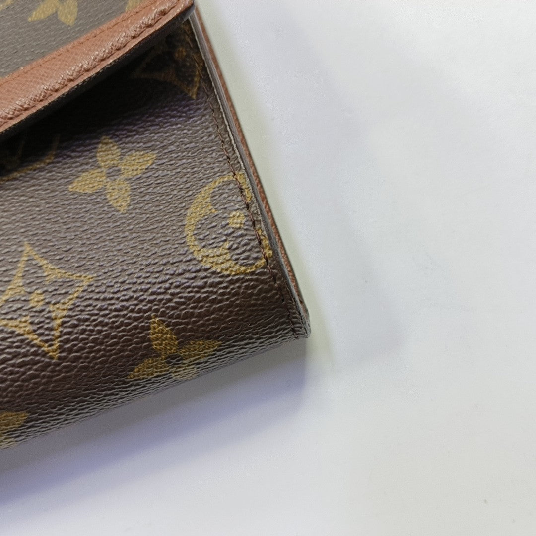 ARCHE Monogram Coated Canvas Brown