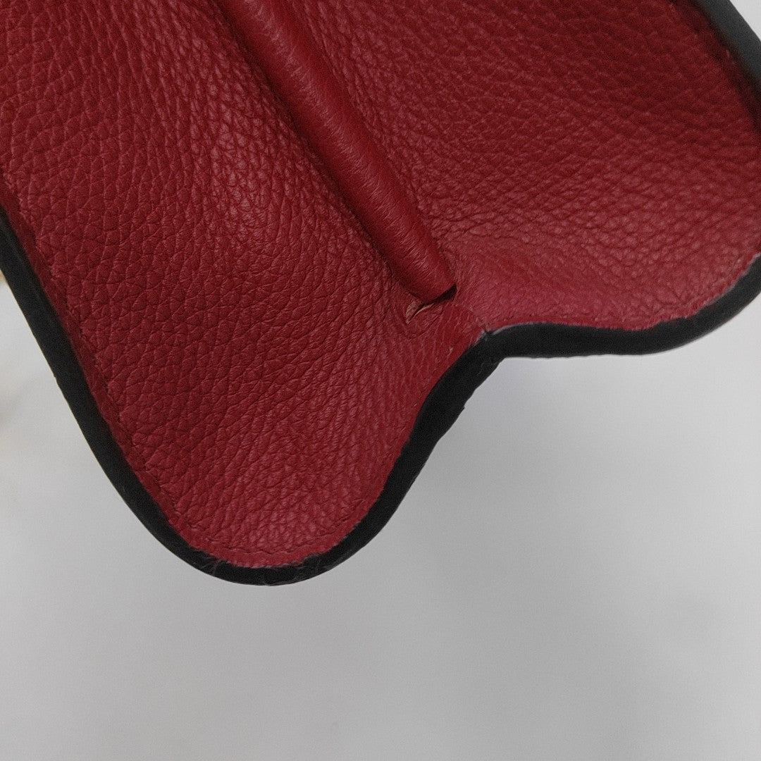 VICTOIRE Monogram Coated Canvas Brown