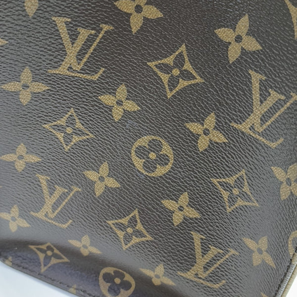 ONTHEGO MM Monogram Coated Canvas Brown