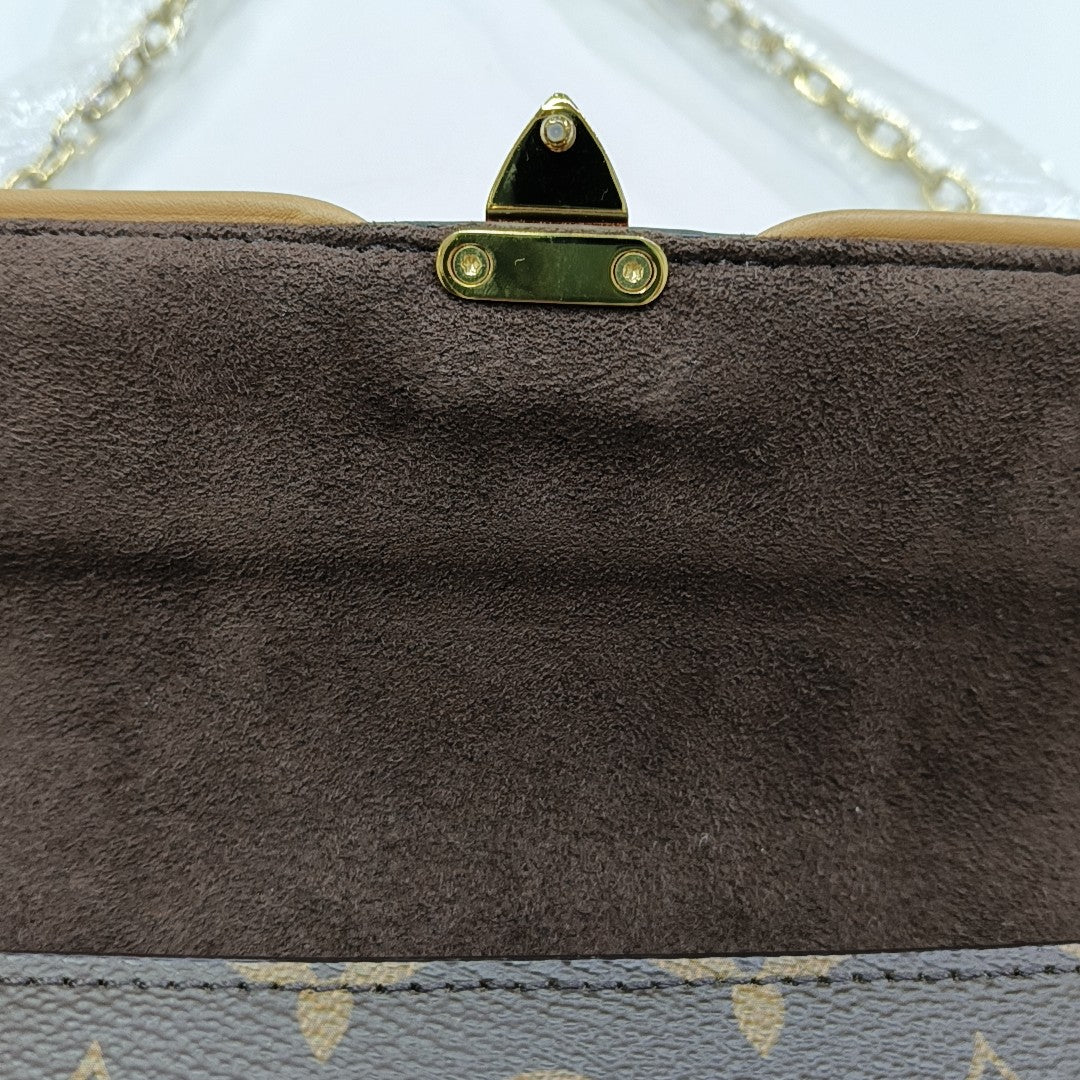 Pochette Camille Monogram Coated Canvas Brown