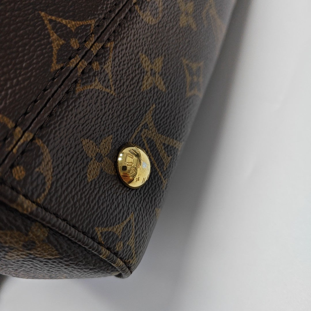 VÉNUS Monogram Coated Canvas Brown
