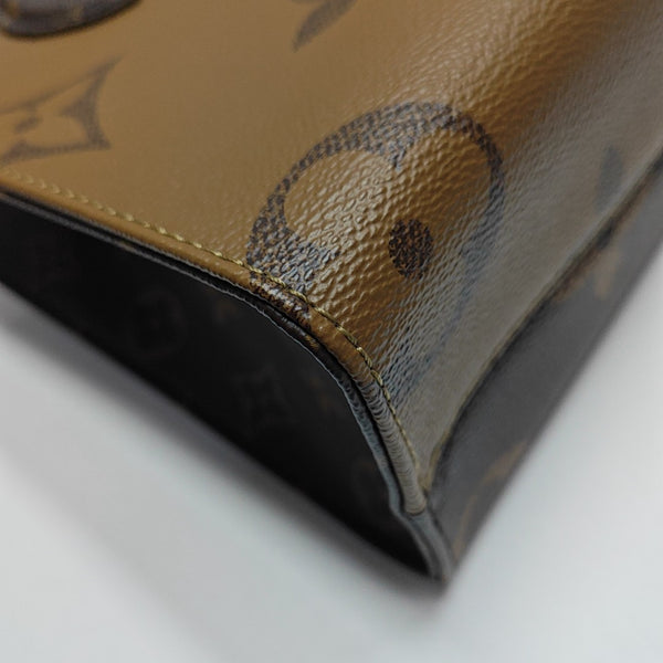 ONTHEGO PM Monogram Coated Canvas Brown