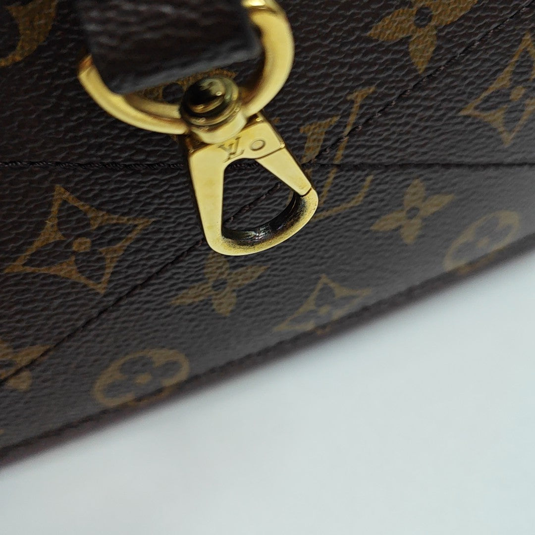 MONTAIGNE Monogram Coated Canvas Brown