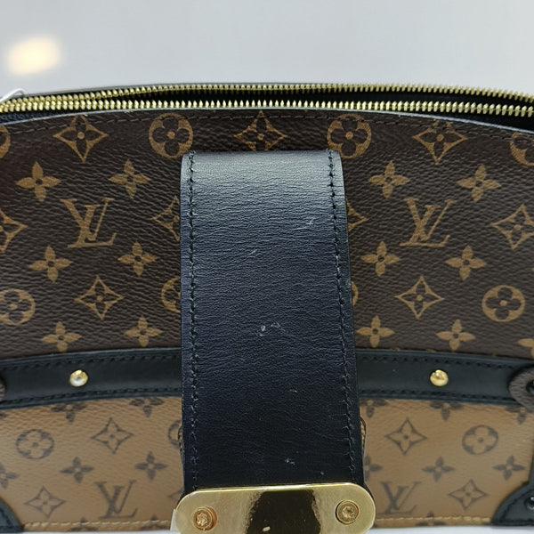 TRUNK Monogram Coated Canvas Brown