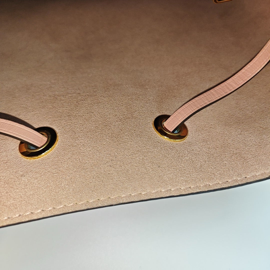 NÉONOÉ MM Monogram Coated Canvas Brown
