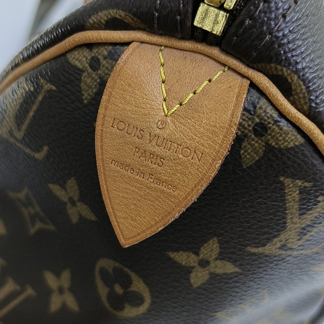 SPEEDY 30 Monogram Coated Canvas Brown