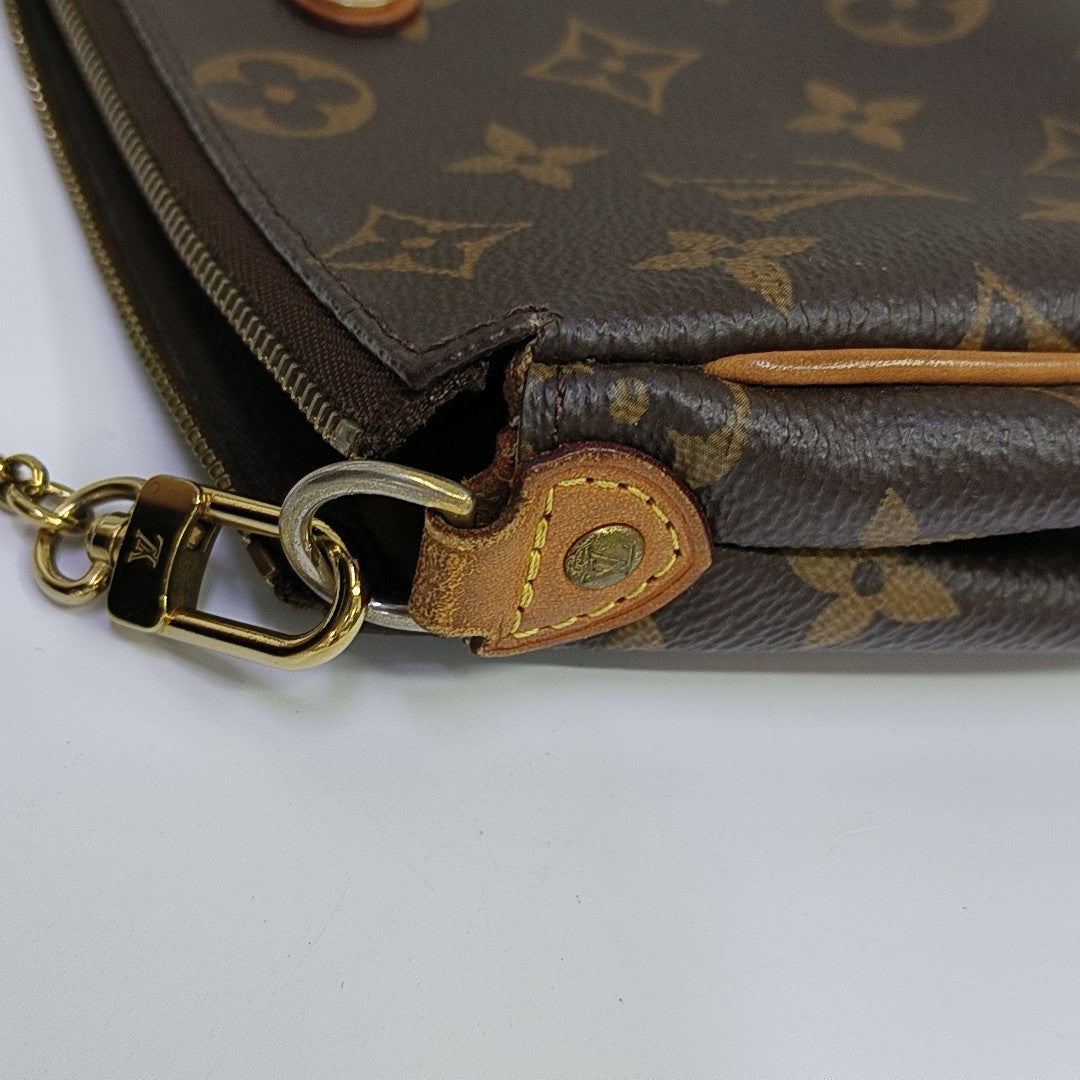 EVA Monogram Coated Canvas Brown