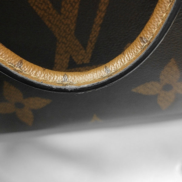 ONTHEGO MM Monogram Coated Canvas Brown