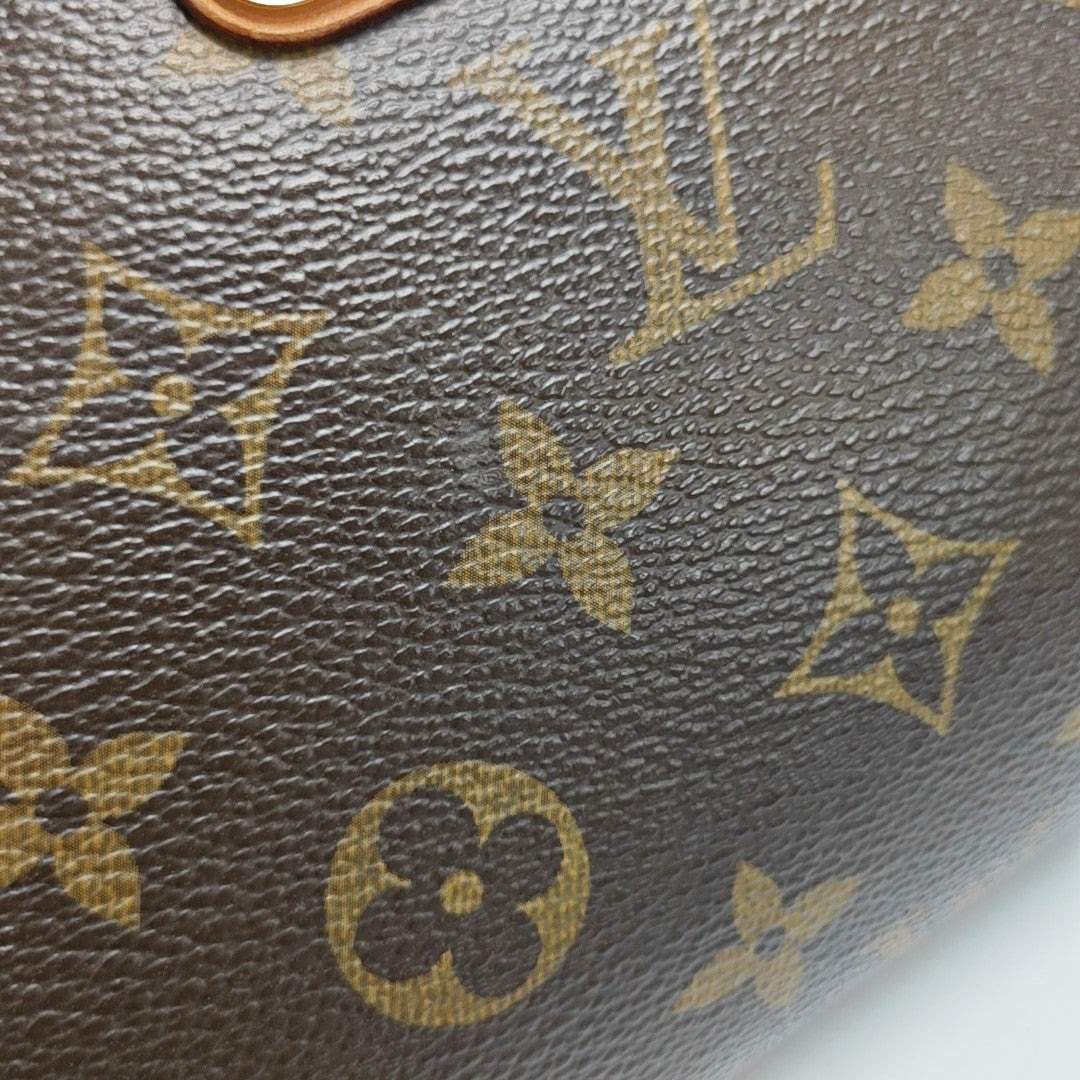 EVA Monogram Coated Canvas Brown