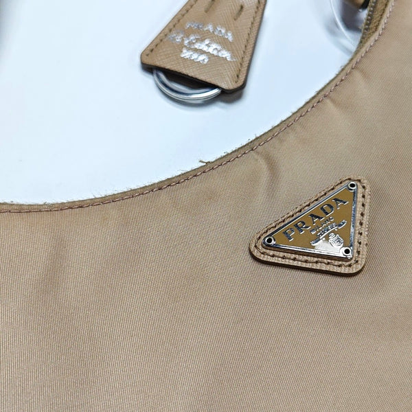 Authenticated pre-owned  Re-Edition2000 Mini Nylon Beige - Top Handle Bag at Looply