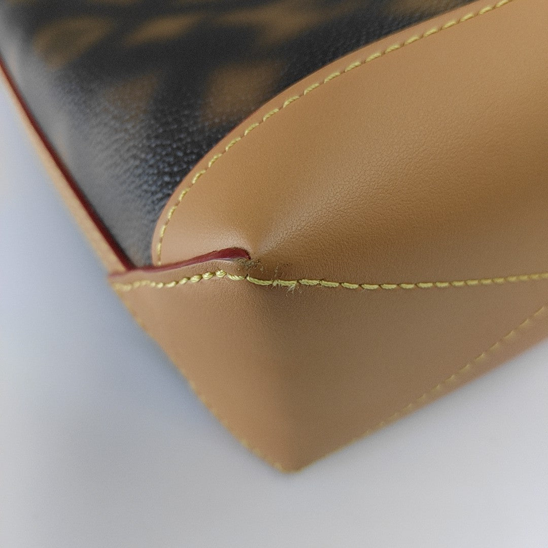 CRUISER Monogram Coated Canvas Brown