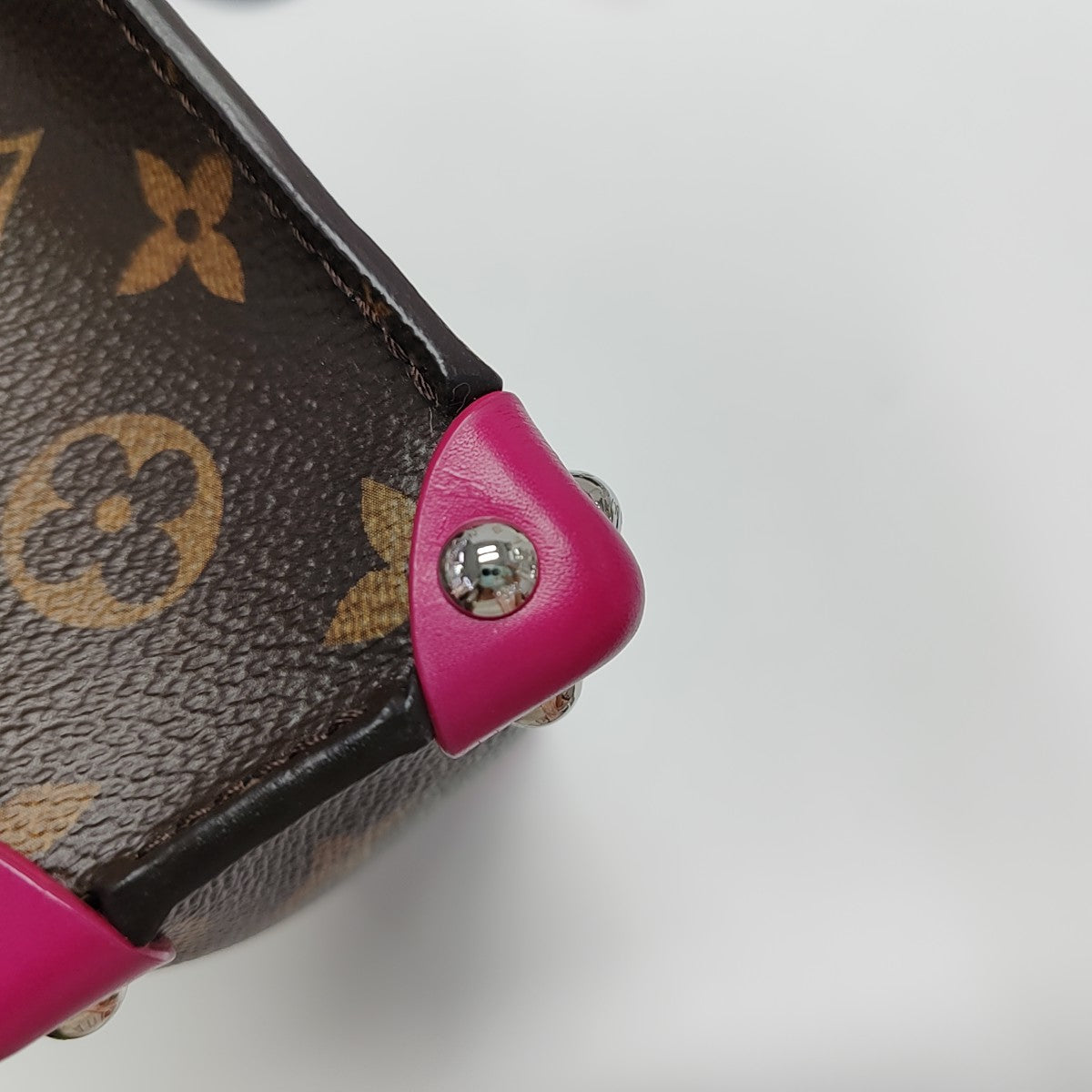TRIBAL MASK PM Monogram Coated Canvas Brown