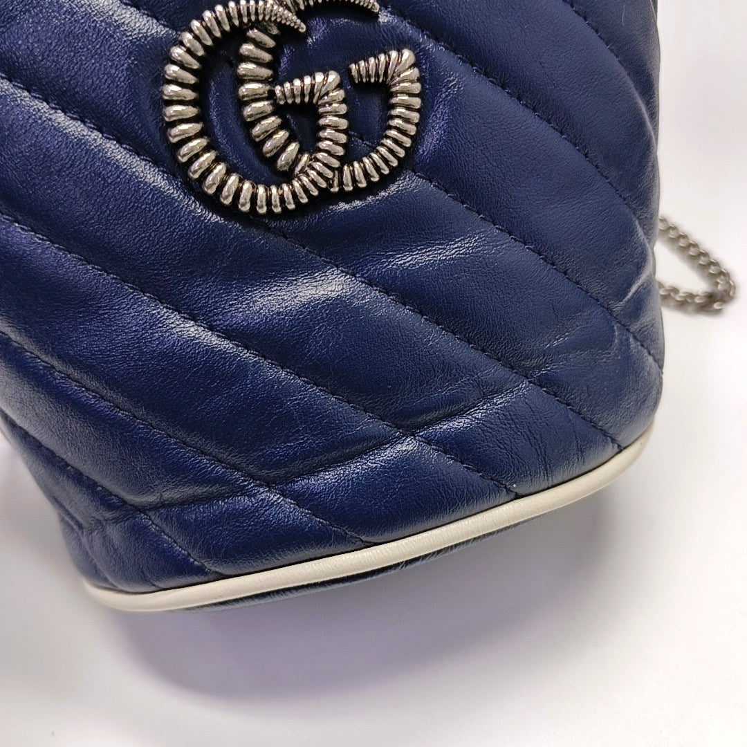 Authenticated pre-owned  GG Marmont Mini Quilted Calfskin Blue - Bucket Bag at Looply