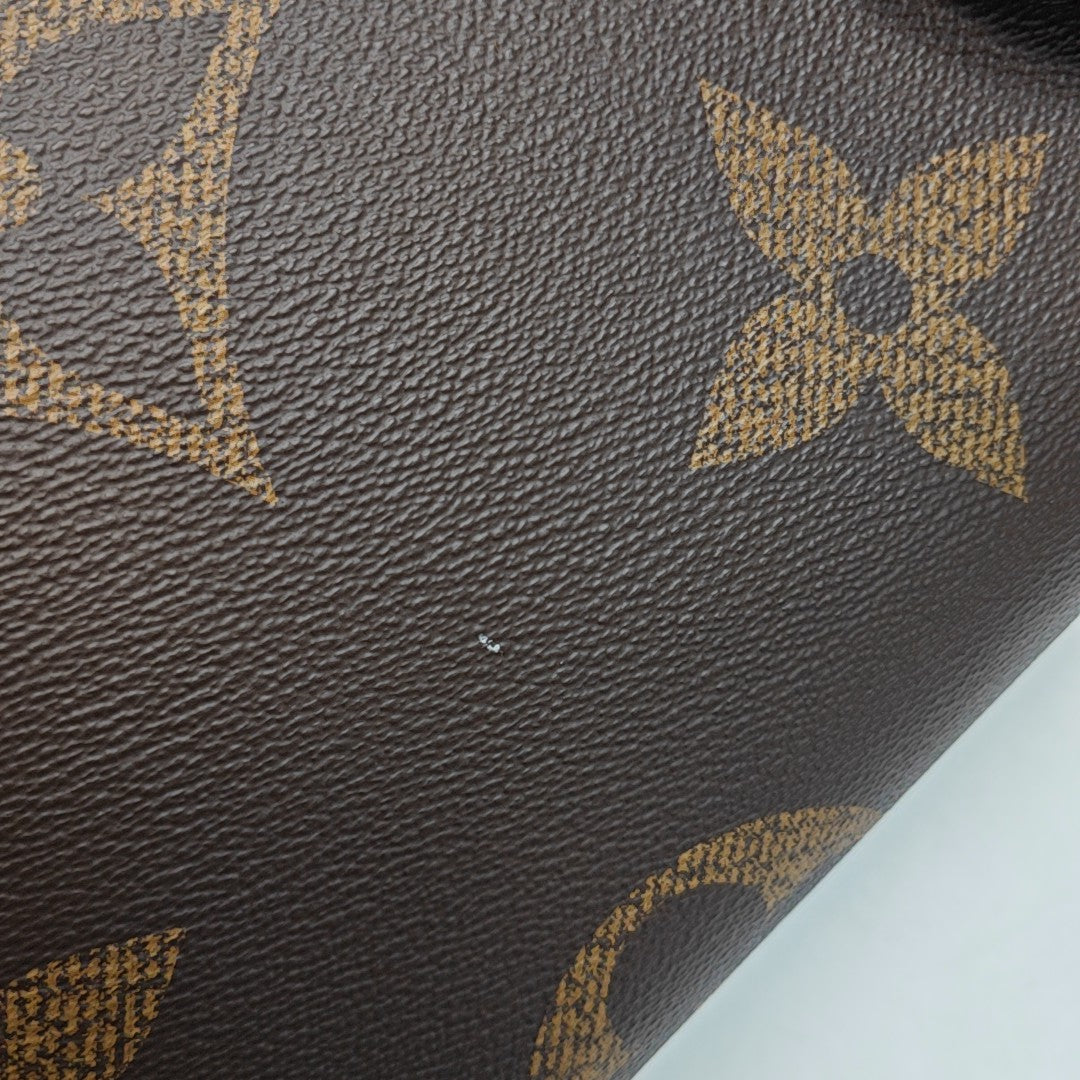 ONTHEGO GM Monogram Coated Canvas Brown