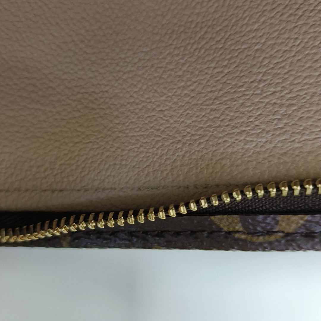 TOILET POCKET 26 Monogram Coated Canvas Brown