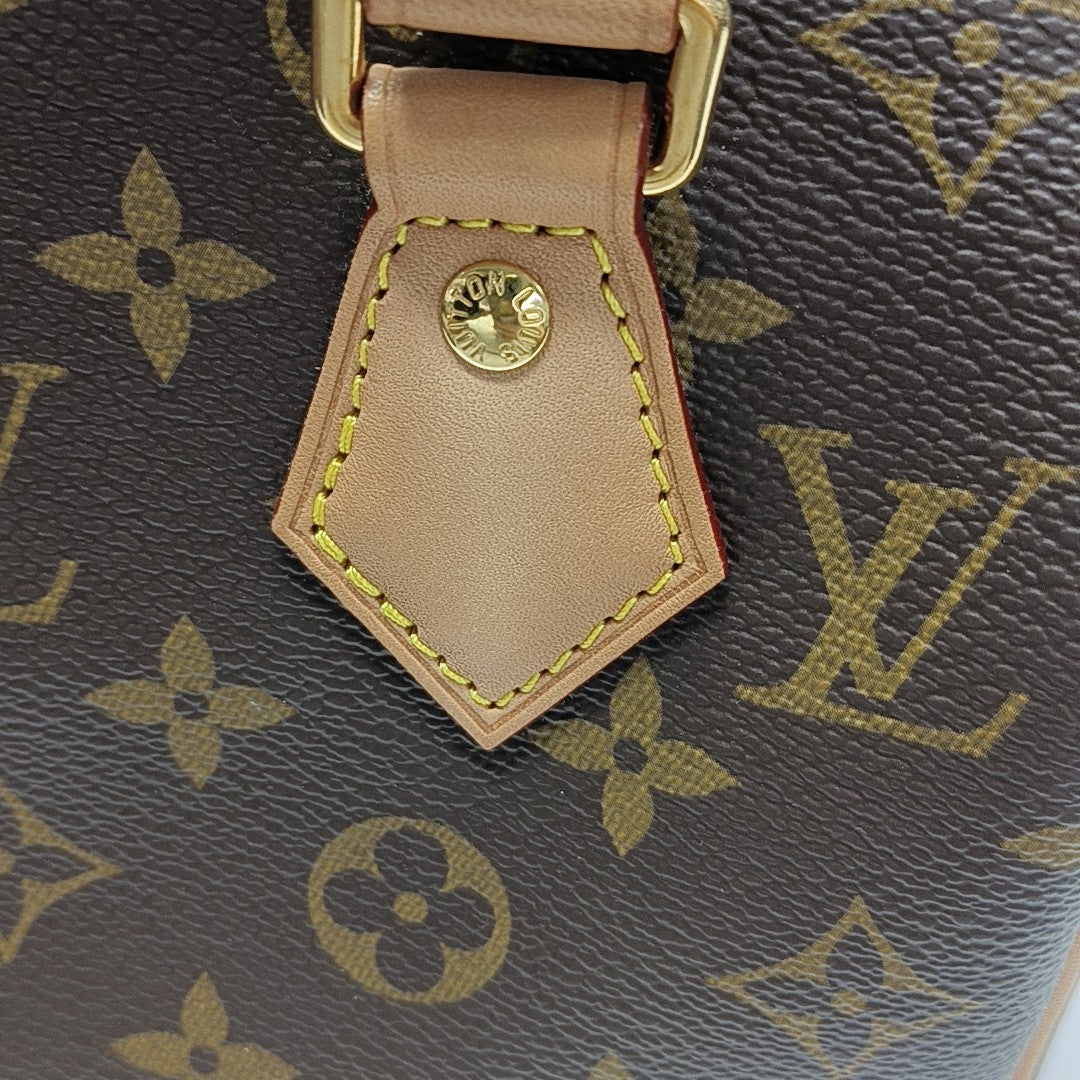 SPEEDY 20 Monogram Coated Canvas Brown