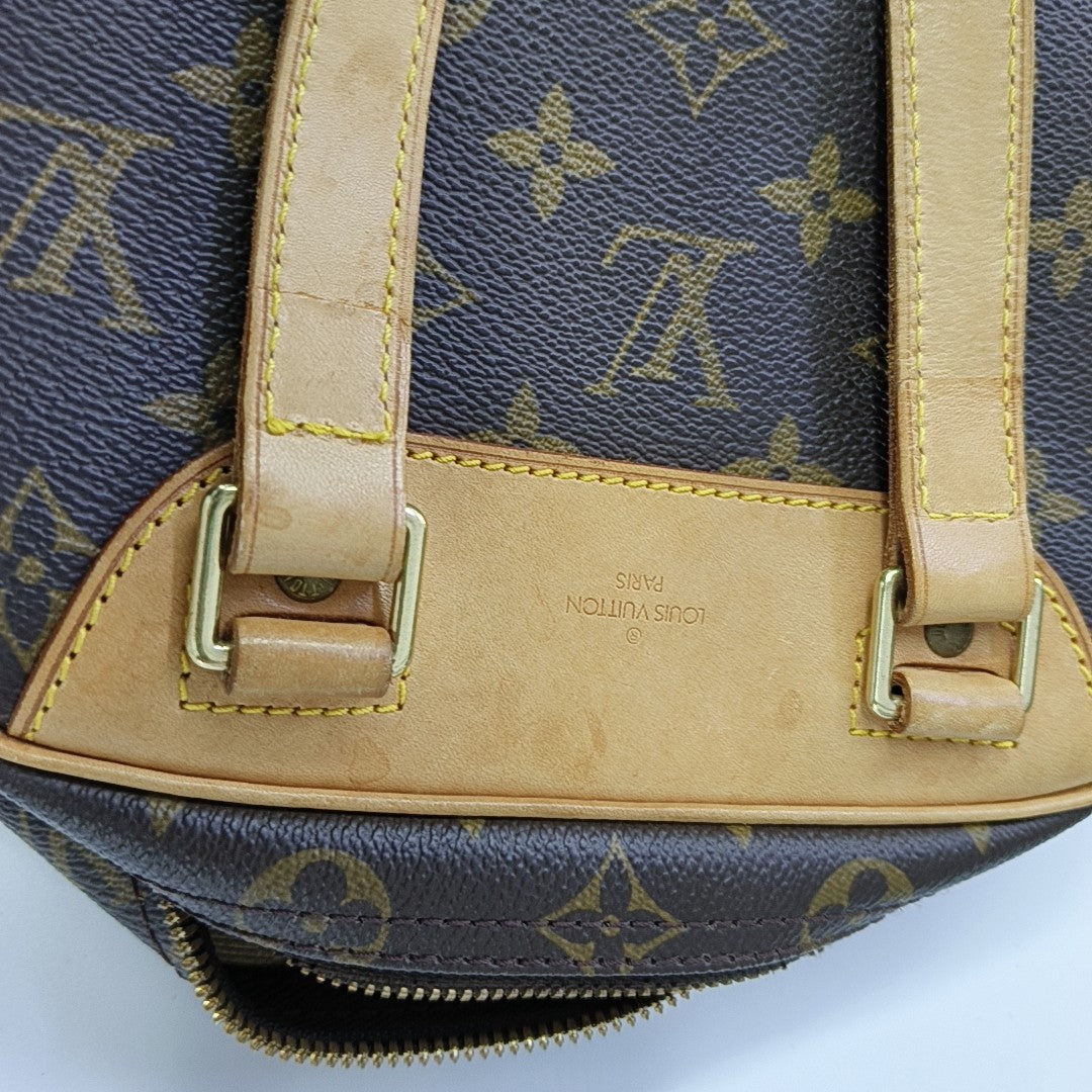EXCURSION Monogram Coated Canvas Brown